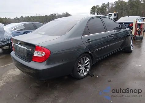 2002 Toyota Camry Xle z USA, uszkodzony, nr VIN 4T1BE30KX2U600688